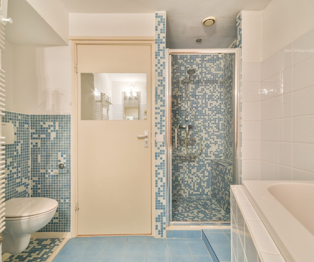 Bathroom with marble walls